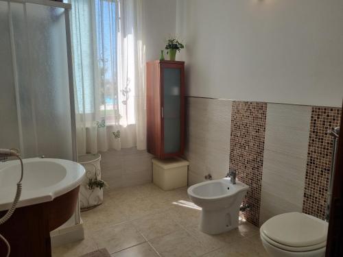 Koupelna v ubytování Casa Sbrizza