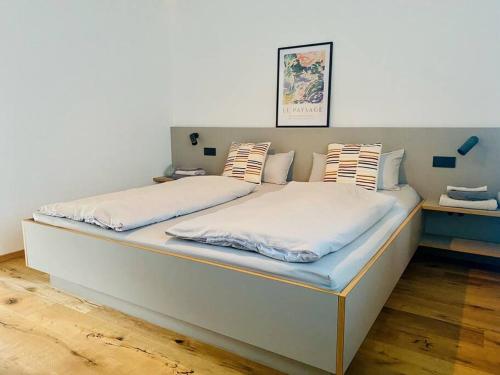 Postel nebo postele na pokoji v ubytování Traumhafte Ferienwohnung in historischem Brandmanngut