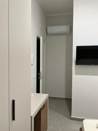 Televisyen dan/atau pusat hiburan di B&B Villa Filù