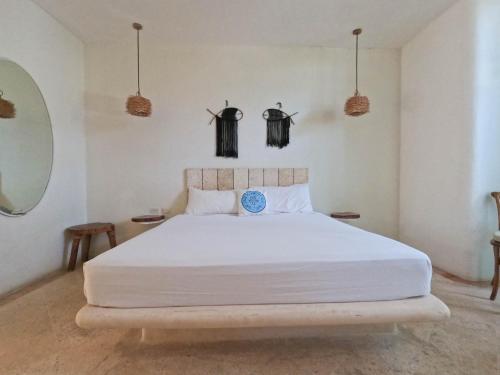 Postel nebo postele na pokoji v ubytování Rustik-inn Rooms