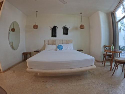 Postel nebo postele na pokoji v ubytování Rustik-inn Rooms