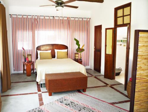 Postel nebo postele na pokoji v ubytování Togo B&B Farallon