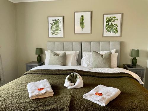 Кровать или кровати в номере Bojangles Guest House