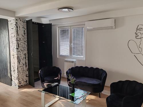 Area soggiorno di Central Modern Flat M&M Apartments
