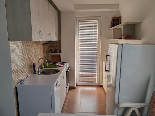 Cucina o angolo cottura di Central Modern Flat M&M Apartments