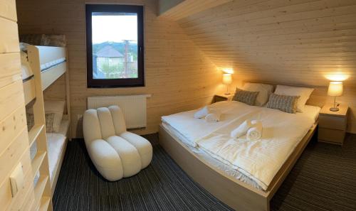 Postel nebo postele na pokoji v ubytování Villa Amálka