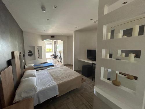Cama o camas de una habitación en La Porta del Mare