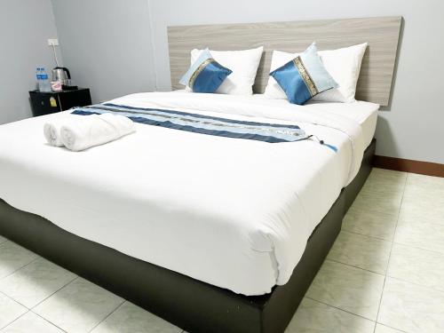 Postel nebo postele na pokoji v ubytování Goody Hotel