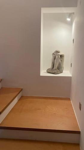 a room with two shoes on a shelf in a wall at Urla Casa Bianca in Urla