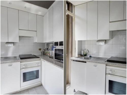 una cucina bianca con armadietti e elettrodomestici bianchi di MilanRentals - Lotto Apartment a Milano