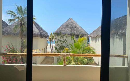 a view from a window of a resort at Cerritos Surf Town - Beach Front Property in El Pescadero
