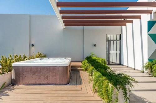 Imagen de la galería de Rooftop Jacuzzi - 18th Floor Apt City View, en Mata de Palo