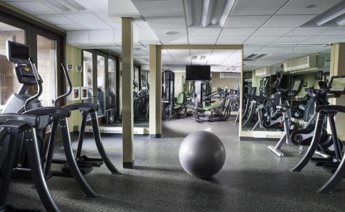 a gym with a bunch of exercise bikes in it at Hotel Terra Jackson Hole, a Noble House Resort in Teton Village