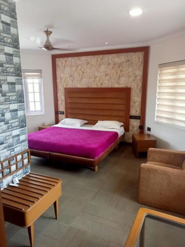 Ένα ή περισσότερα κρεβάτια σε δωμάτιο στο La Gabriell beach inn