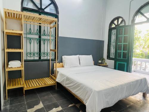 Кровать или кровати в номере Hanoi AVANA HOMESTAY LONG BIEN