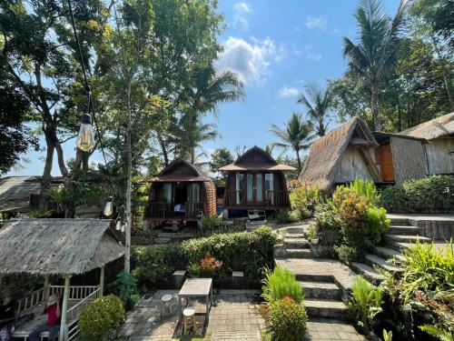 - un groupe de cottages dans un complexe dans l'établissement Taman Asta Gangga by ecommerceloka, à Silebeng