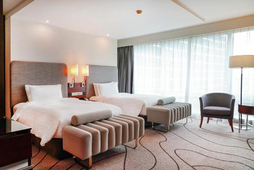 Katil atau katil-katil dalam bilik di Pullman Shanghai Central - In XinTianDi & Yu Garden Area
