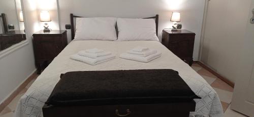 Een bed of bedden in een kamer bij Ακαδημία Πλάτωνος