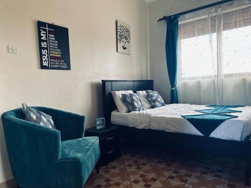 Ein Bett oder Betten in einem Zimmer der Unterkunft Chayil Loft Mulago