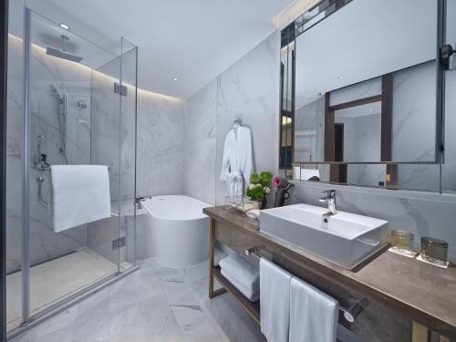Bilik mandi di Jin Jiang International Hotel Taicang