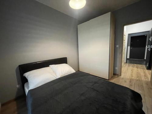 Katil atau katil-katil dalam bilik di VIP Apartamenty Witolda