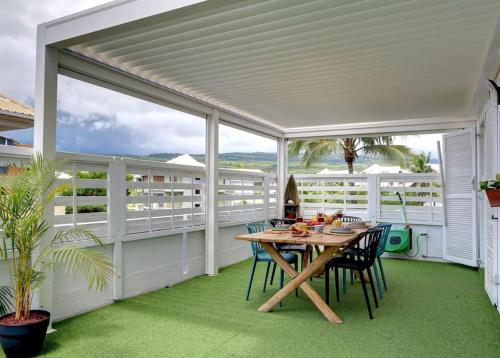 En balkon eller terrasse på NYLA Mango