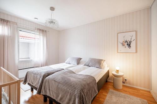 Llit o llits en una habitació de Villa Nordic Rovaniemi