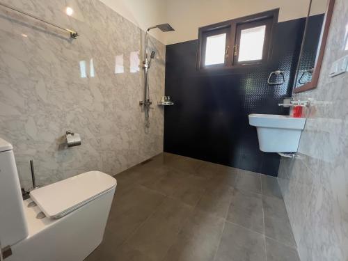 Koupelna v ubytování Lum Residence