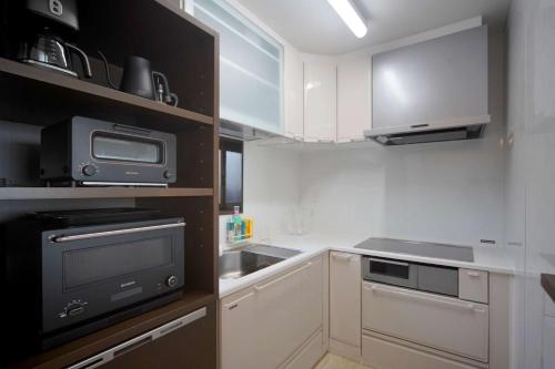 Η κουζίνα ή μικρή κουζίνα στο Nesoberi　VILLA TAKASU