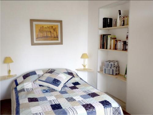 Un pat sau paturi într-o cameră la Maison de charme Corse sauvage