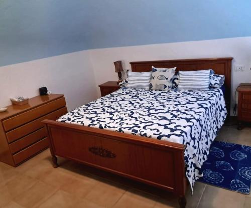 Säng eller sängar i ett rum på BeachHouse Ischia