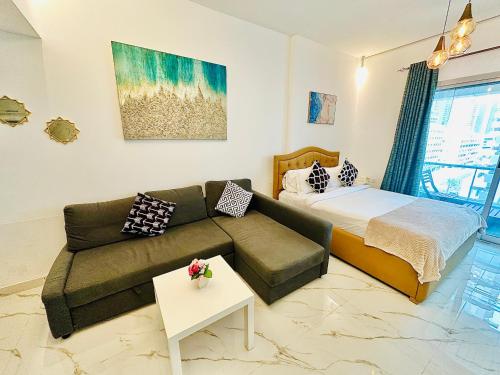 Posezení v ubytování Diamond Crown - Studio Holiday Apartment in Dubai Marina