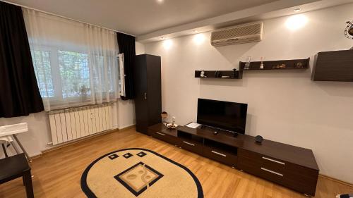 Μια τηλεόραση ή/και κέντρο ψυχαγωγίας στο Cozy flat near the city center