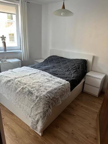 Postel nebo postele na pokoji v ubytování Apartament Centrum