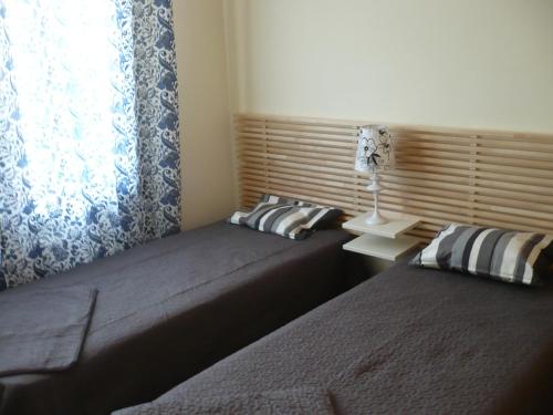 Postel nebo postele na pokoji v ubytování Atico, Piscina, Aire Acondicionado, WI-FI, Parking Gratis, Gran Terraza