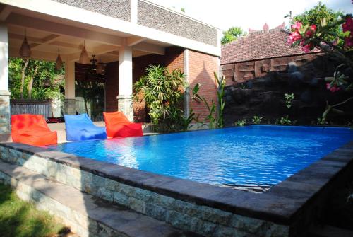 The swimming pool at or close to Oma In Pemuteran Bali