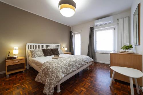 Postel nebo postele na pokoji v ubytování Casa Marlò Centro Storico