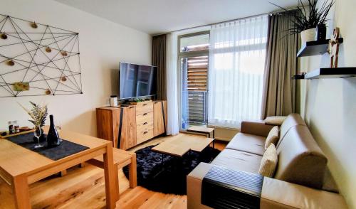 PP44 - Moderní, slunný a stylový apartmán 1KK v centru Harrachova s balkonem a parkováním v zabezpečené garáži