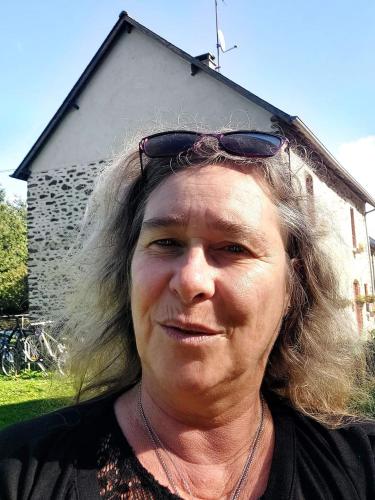 a woman with sunglasses on top of her head at La lavandiere in La Chapelle-au-Riboul