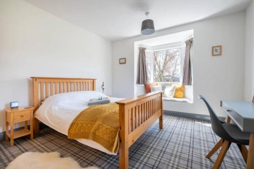 Postelja oz. postelje v sobi nastanitve Cosy Hygge/ Scottish themed home by Loch Ness