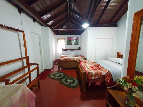 Postel nebo postele na pokoji v ubytování Ruchi House