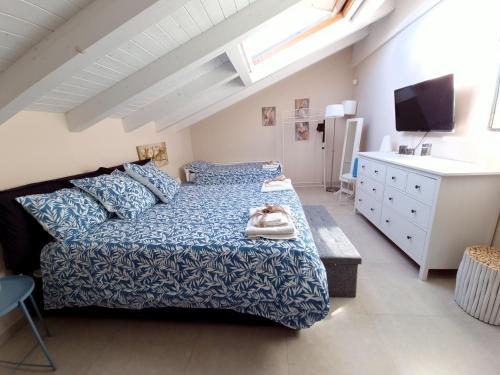 Posteľ alebo postele v izbe v ubytovaní Luxury Relaxing Home near Catania, Taormina, the Sea and Mount Etna