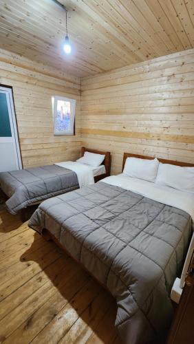 Postel nebo postele na pokoji v ubytování Livadhi Guesthouse