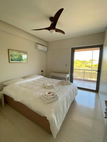 Postel nebo postele na pokoji v ubytování Zouberi Twins Luxury Appartements (North)