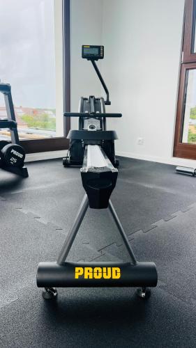 a gym with a push up machine in a room at Apartamenty Belni Hel Edyta i Maciej Wolak in Hel