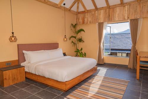 Letto o letti in una camera di Dorje's Resort and Spa
