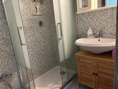 a bathroom with a shower and a sink at Tiny House - Lake Maggiore -Malpensa Airport - in Varallo Pombia