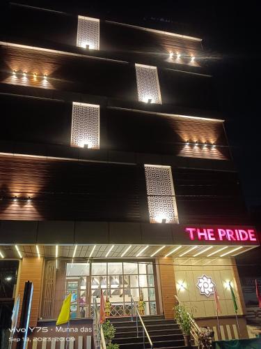 a building with lights on top of it at night at The Pride in Jamshedpur