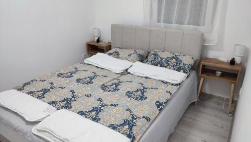 Postel nebo postele na pokoji v ubytování Apartman Bogdanovic