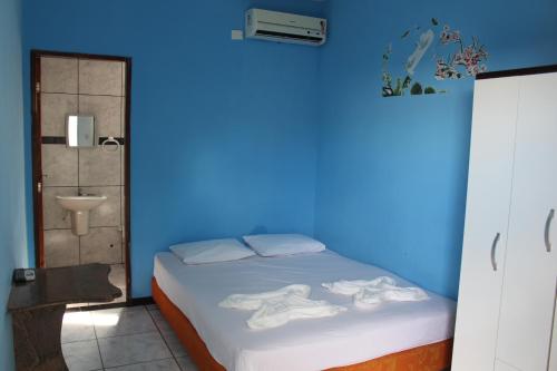 En eller flere senger på et rom på Pousada Brisa Costeira Porto FP
